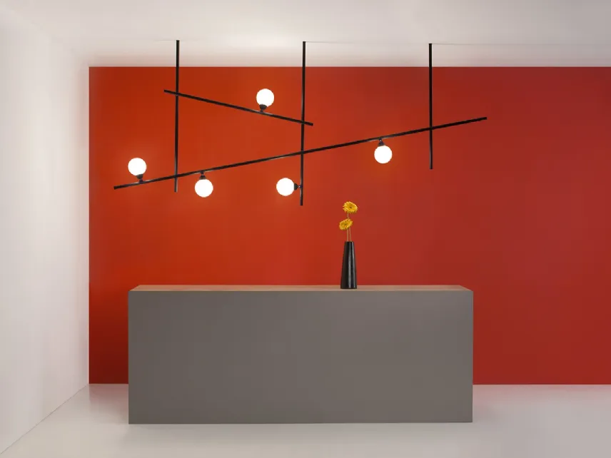 Lampada in metallo con giochi geometrici Freeline di Fabbian