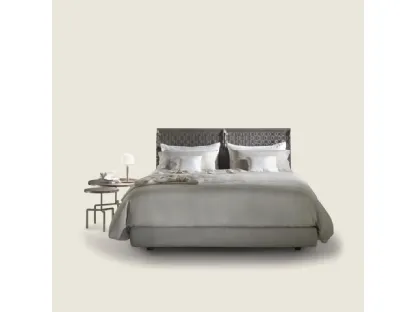 Letto con testiera in cuoio intrecciato Cestone di Flexform