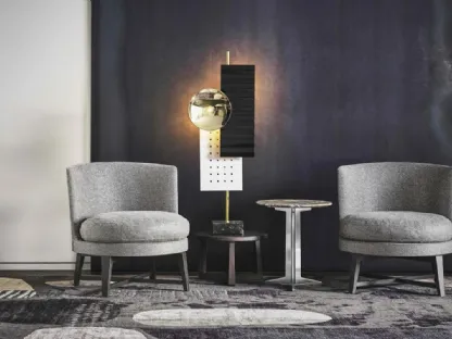 Poltroncina tonda in tessuto imbottito con gambe in metallo satinato Feel Good di Flexform