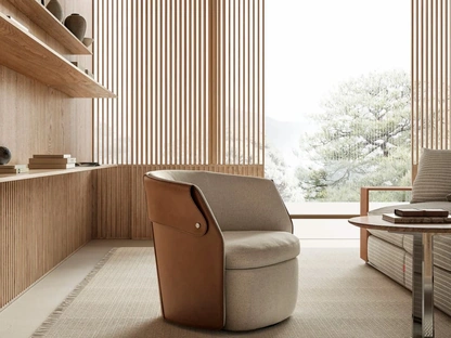 Poltroncina Ozzy in tessuto imbottito e cuoio di Flexform