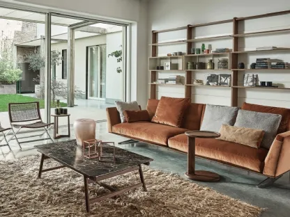 Divano lineare in tessuto con base in metallo rivestita in cuoio Evergreen di Flexform