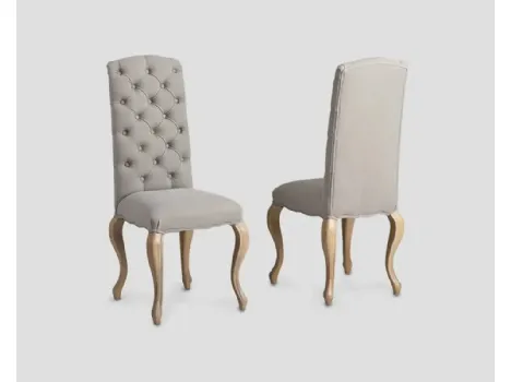 Sedia Flaminia in tessuto imbottito e trapuntato con struttura in legno massello di Rovere di Dialma Brown