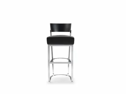 Sgabello Morgan con struttura in metallo, schienale in legno massello e seduta in pelle imbottita di Flexform