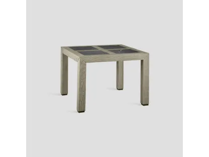 Tavolo quadrato Agorà Stone realizzato in legno massello di Conifera lavorato a mano con top con inserti in grès porcellanato finitura Pietra di Dialma Brown