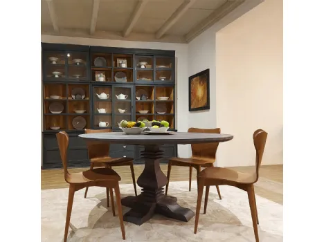 Tavolo tondo Dorton realizzato in legno stratificato e legno massello di Conifera finitura Dark Grey di Dialma Brown