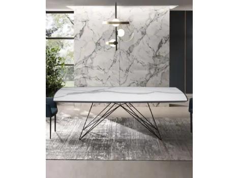 Tavolo Pegaso con top in Legno con inserto in Ceramica e base in tondino di acciaio di Riflessi