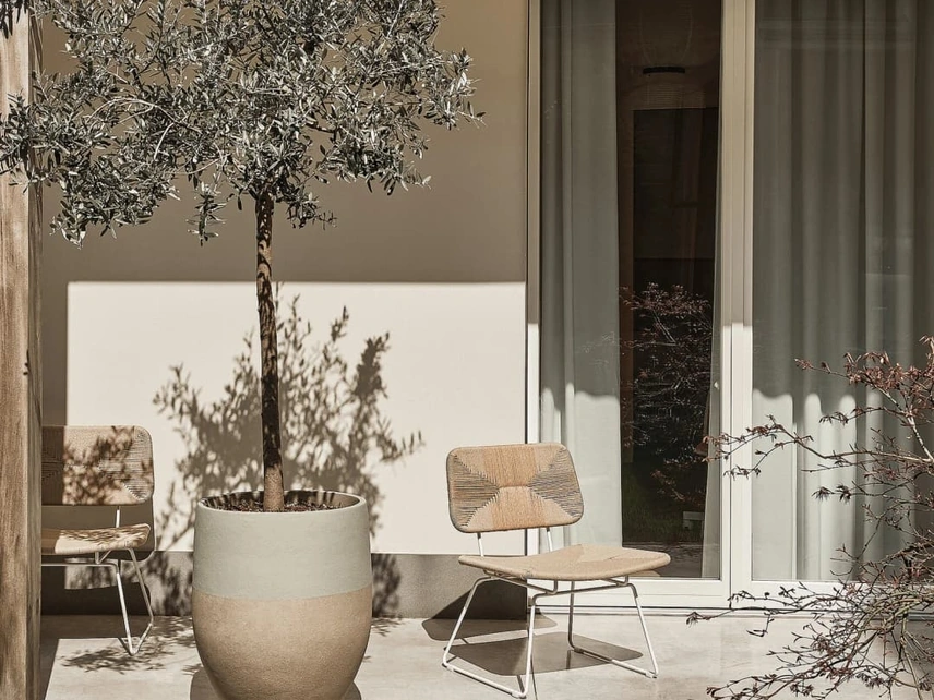 Poltroncina Echoes Outdoor in cordoncino di polipropilene e acciaio di Flexform