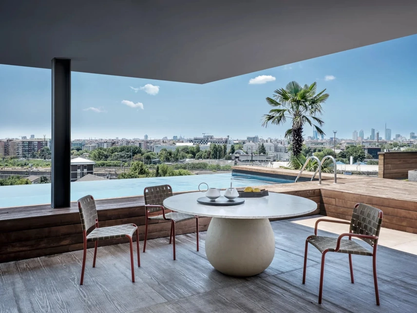 Tavolo Tondo Inout in marmo e cemento di Gervasoni