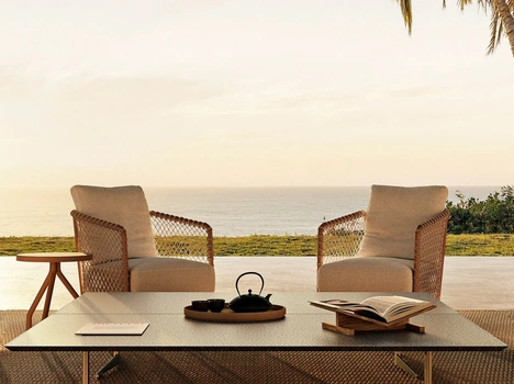Poltroncina Oasis in metallo e corda intrecciata di Flexform