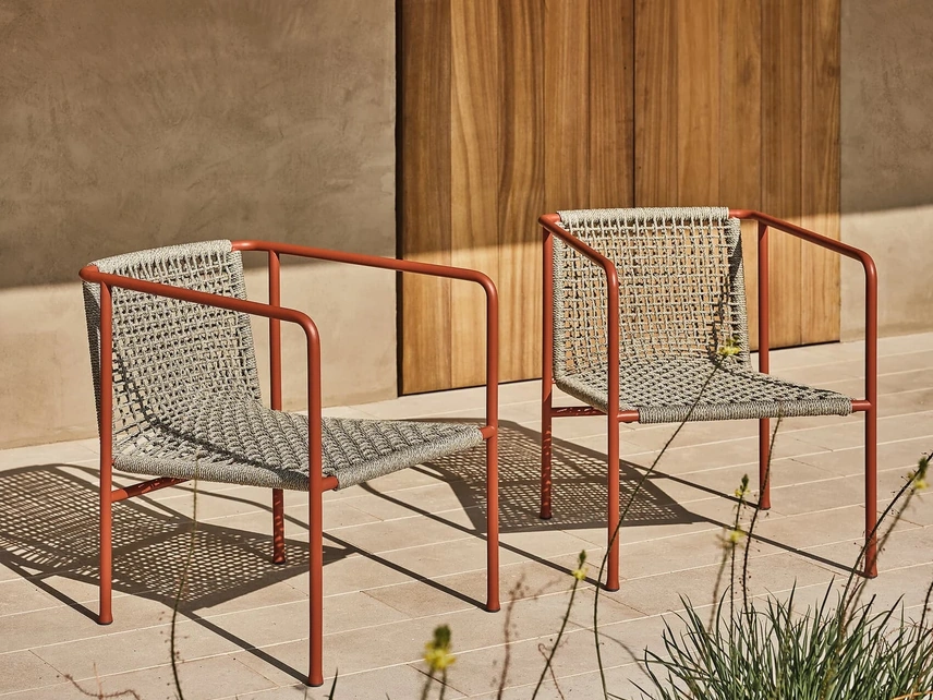 Poltroncina in metallo con corda intrecciata Ottavia di Flexform